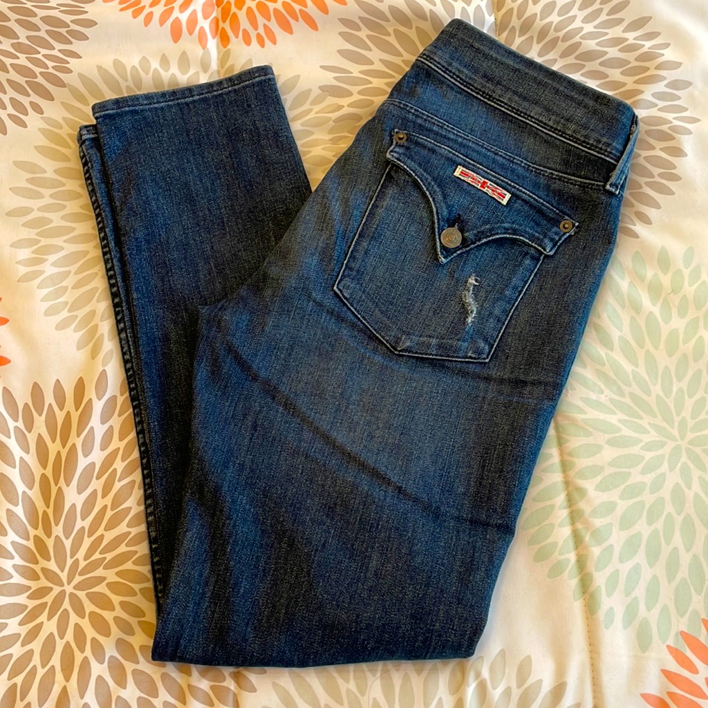 Dark wash Hudson low-rise jeans photographed flat with the retail tag still attached